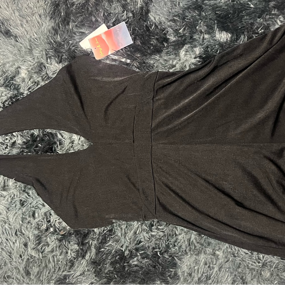 Black medium open back romper.